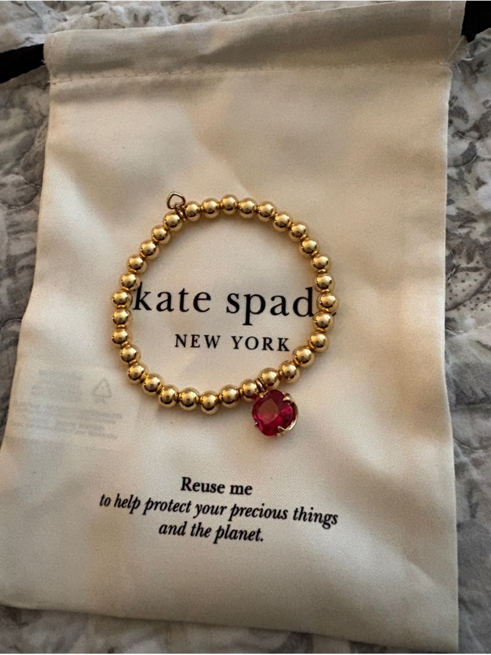kate spade Gold Beaded Bracelet with Red Gem Charm